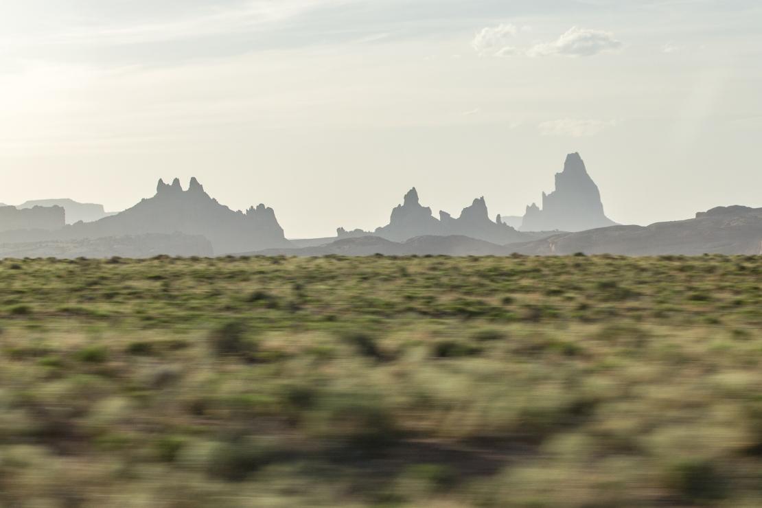 Motion-blurred landscape with mountains in the distance